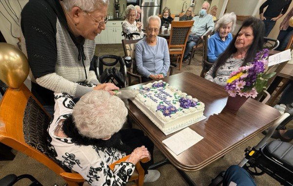 Village on the Thames celebrates resident's 102nd birthday